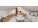 Open bonus room with sloped ceilings and stylish decor at 814 S Mcdonough St, Decatur, GA 30030