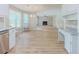 Bright, open concept with eat-in kitchen, stainless appliances and great view into living room at 1904 Watercrest Cir, Lawrenceville, GA 30043