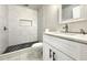 Stylish bathroom with a tiled walk-in shower, modern fixtures, and a sleek design at 1914 North Nw Ave, Atlanta, GA 30318
