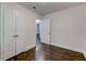 Bedroom features hardwood floors, a double door closet, and an open doorway to another room at 1914 North Nw Ave, Atlanta, GA 30318