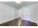Bedroom features hardwood floors, a double door closet, and an open doorway to another room at 1914 North Nw Ave, Atlanta, GA 30318