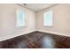 Cozy bedroom features multiple windows, offering ample natural light and outside views at 1914 North Nw Ave, Atlanta, GA 30318