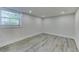 Bright room with light-colored vinyl flooring, white walls, and a window that lets in lots of light at 1914 North Nw Ave, Atlanta, GA 30318