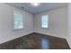 Bedroom with hardwood flooring, white walls, one window and white trim at 1914 North Nw Ave, Atlanta, GA 30318