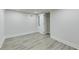 Bright room with light-colored vinyl flooring, white walls, and a closet at 1914 North Nw Ave, Atlanta, GA 30318