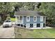 Charming blue two-story home with front porch, car in driveway, and well-maintained lawn at 1914 North Nw Ave, Atlanta, GA 30318