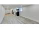 Kitchen with stainless steel appliances and white cabinetry, in a room with light-colored vinyl flooring at 1914 North Nw Ave, Atlanta, GA 30318