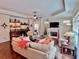 Inviting living room with fireplace, built-in shelving, and plush seating at 245 Fenwick Cir, Mcdonough, GA 30253