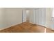 Bright bedroom with hardwood floors, closet and an open door at 2826 Summit Ridge Dr, Marietta, GA 30066
