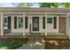 Inviting front porch featuring stylish columns, a brick base, and a welcoming entryway at 2826 Summit Ridge Dr, Marietta, GA 30066