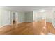 Open-concept living room featuring hardwood floors and access to other rooms in the home at 2826 Summit Ridge Dr, Marietta, GA 30066