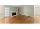 Open-concept living room featuring a fireplace and hardwood floors at 2826 Summit Ridge Dr, Marietta, GA 30066