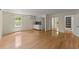 Bright living space with a kitchenette has natural light, hardwood floors, and easy access to the outdoors at 2826 Summit Ridge Dr, Marietta, GA 30066