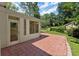 Brick patio extending from a sunroom overlooking green grass at 2826 Summit Ridge Dr, Marietta, GA 30066