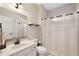 Clean bathroom with a white vanity, modern sink, and neutral-toned decor at 2740 Greymont Ct, Cumming, GA 30041
