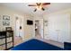 Spacious bedroom includes a ceiling fan, closet, and adjoins the bathroom and other bedrooms at 2740 Greymont Ct, Cumming, GA 30041
