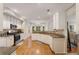 Spacious kitchen with white cabinets, granite countertops, and stainless steel appliances at 2740 Greymont Ct, Cumming, GA 30041