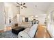 Bright and airy living room with vaulted ceilings, hardwood floors, and an open floor plan at 2740 Greymont Ct, Cumming, GA 30041