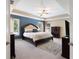 Beautiful primary bedroom featuring tray ceilings, neutral colors, and lots of natural light at 2740 Greymont Ct, Cumming, GA 30041