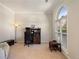 Bright office space featuring a large arched window, a cozy chair, and a functional desk setup, ideal for productivity at 2740 Greymont Ct, Cumming, GA 30041