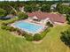 Large community pool with plenty of lounge chairs for relaxing in the sun at 2740 Greymont Ct, Cumming, GA 30041