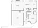 First floor plan showing an attached garage, living room, kitchen, dining room, and laundry room at 275 Springs Xing, Canton, GA 30114