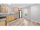 Charming kitchen featuring stainless steel appliances, light wood cabinets, and granite countertops, designed for culinary enthusiasts at 275 Springs Xing, Canton, GA 30114