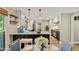 Stylish kitchen with a central island, barstool seating, and stainless steel appliances at 115 Edgewater Way, Peachtree City, GA 30269
