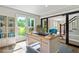 Bright office with natural light, custom bookshelves, and wood floors at 115 Edgewater Way, Peachtree City, GA 30269