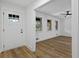 A bright living room with wood-look flooring, natural light, and white trim at 1400 North Avenue Nw, Atlanta, GA 30318