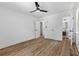 Bright primary bedroom with wood floors and ensuite bathroom at 1400 North Avenue Nw, Atlanta, GA 30318