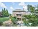 Expansive backyard with stone steps and lush landscaping, perfect for outdoor entertaining at 2380 Tayside Nw Xing, Kennesaw, GA 30152
