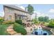 Enjoy the outdoors with a pool, covered patio, and beautifully landscaped backyard at 2380 Tayside Nw Xing, Kennesaw, GA 30152