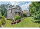 Brick home with professionally landscaped front yard and inviting entrance at 2380 Tayside Nw Xing, Kennesaw, GA 30152