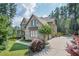 Beautiful brick home with a well-maintained lawn and a side-entry garage at 2380 Tayside Nw Xing, Kennesaw, GA 30152