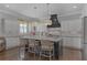 Spacious kitchen featuring a large center island, granite countertops, and stainless steel appliances at 2380 Tayside Nw Xing, Kennesaw, GA 30152