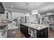 Bright kitchen with granite countertops, stainless steel appliances, and a functional center island at 2380 Tayside Nw Xing, Kennesaw, GA 30152