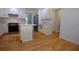 Bright kitchen with white cabinets, stainless steel appliances, marble countertops, and new hardware at 260 Lakemont Dr, Roswell, GA 30075