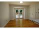 Bright room with hardwood floors and patio access at 260 Lakemont Dr, Roswell, GA 30075