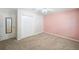 Bedroom featuring neutral carpet, closet, and natural light at 3506 Billingsley Dr, Marietta, GA 30062
