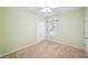 Cozy bedroom featuring neutral carpet, and a window providing natural light at 3506 Billingsley Dr, Marietta, GA 30062
