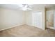 Bedroom featuring neutral carpet, ceiling fan, closet, and natural light at 3506 Billingsley Dr, Marietta, GA 30062