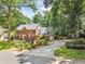 Charming two-story brick home with a long driveway and beautifully landscaped front yard at 3506 Billingsley Dr, Marietta, GA 30062