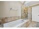 Luxurious main bathroom with a soaking tub, separate shower, and neutral design at 3506 Billingsley Dr, Marietta, GA 30062