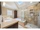 Spa-like main bathroom with walk-in shower, soaking tub, and skylight at 3506 Billingsley Dr, Marietta, GA 30062