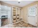 Convenient mud room features tiled floor, built-in storage, and access to outdoors at 3506 Billingsley Dr, Marietta, GA 30062