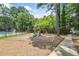 Well-maintained playground area with multiple play structures and mature trees in the background at 3506 Billingsley Dr, Marietta, GA 30062
