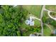 Aerial shot of a beautiful home with a pool, lush backyard and mature trees at 2101 Thomas Rd, Canton, GA 30115