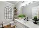 Elegant bathroom with marble countertop, modern fixtures, and decorative accents at 2101 Thomas Rd, Canton, GA 30115