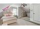 Charming bedroom featuring sloped ceilings and cozy decor at 2101 Thomas Rd, Canton, GA 30115